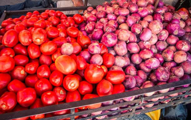 A kg of tomato is sold at Rs 15 to Rs 20 in Chennai Koyambedu vegetable market KAK