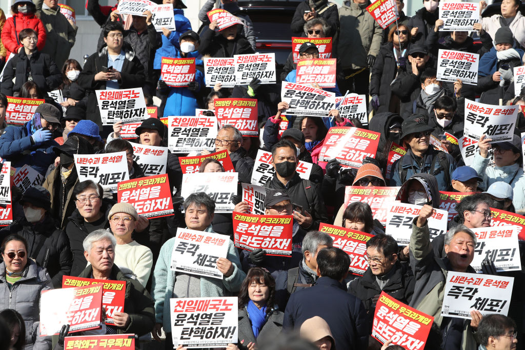 South Korean opposition lawmakers move to impeach President Yoon over short-lived martial law snt