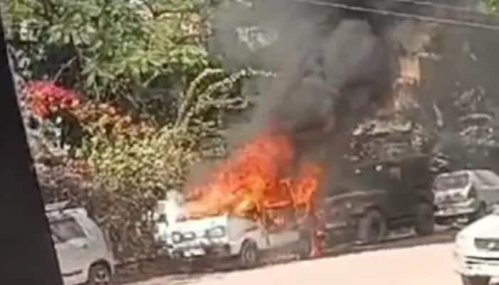 Maruti van parked on busy street catches fire and LPG cylinder blast suspected 