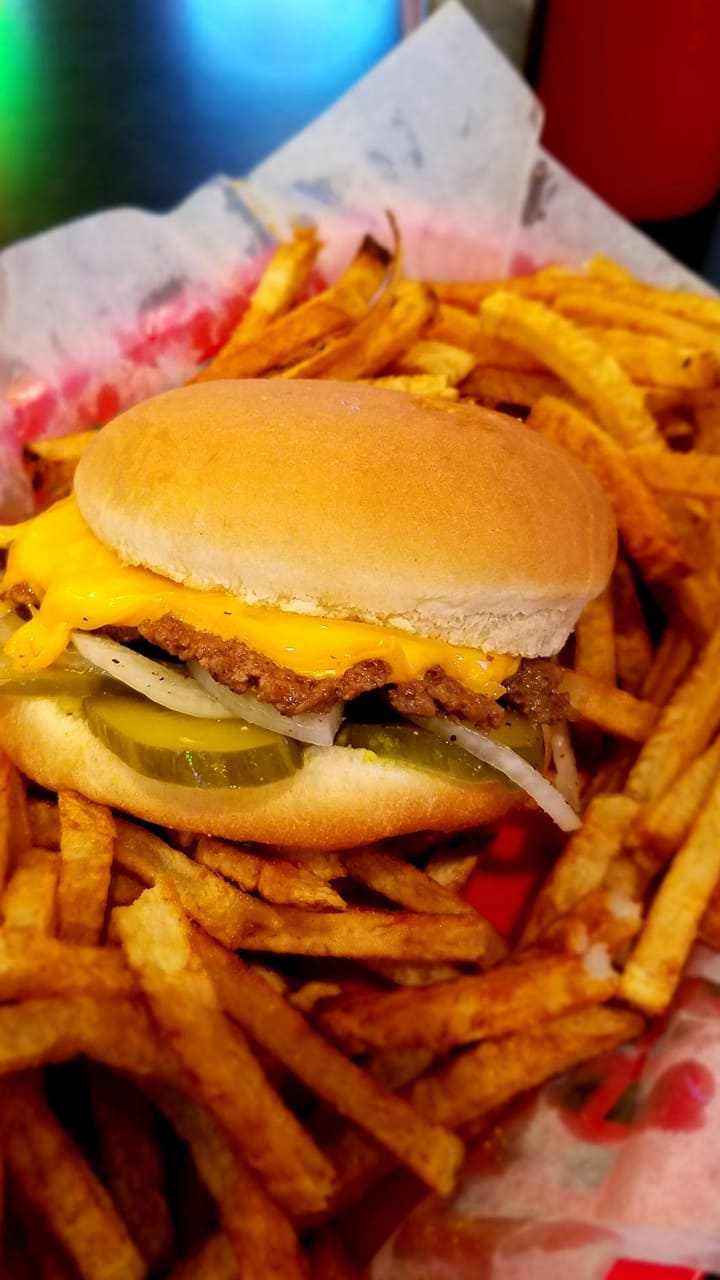 Savoring history: 100-year-old griddle cooked burgers delight food lovers AJR