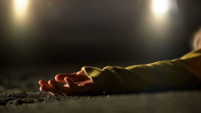 female dead body wrapped in blanket