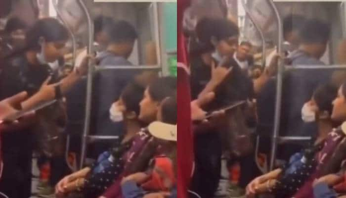 woman in delhi metro argument with another woman claims her boyfriend is sub inspector in delhi police 