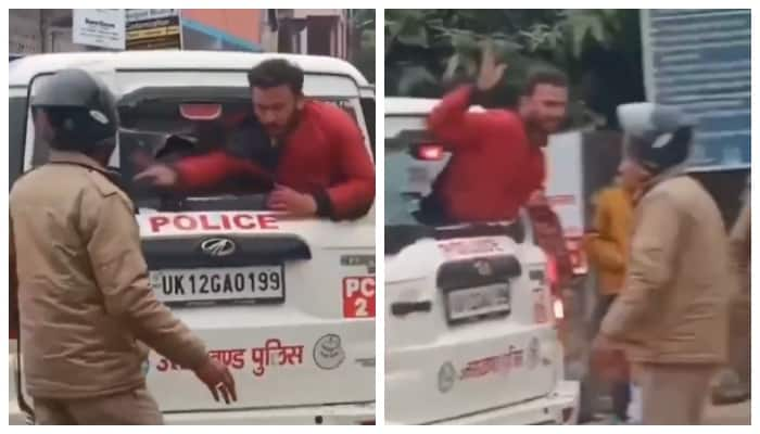 Viral Video man breaking the glass of a police vehicle and making derogatory remarks