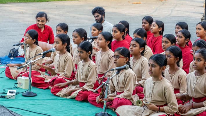 Thevaram Pannisai performance by Sadhguru Gurukulam Sanskriti students across Tamil Nadu tvk