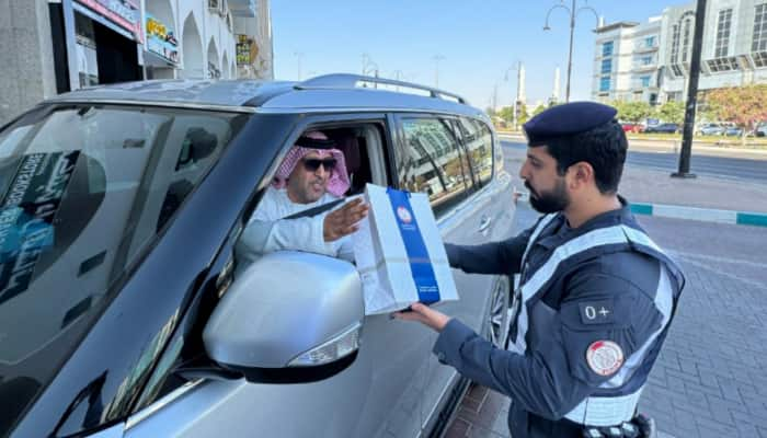 UAE: Abu Dhabi police surprise 60 drivers with gifts for following traffic rules anr