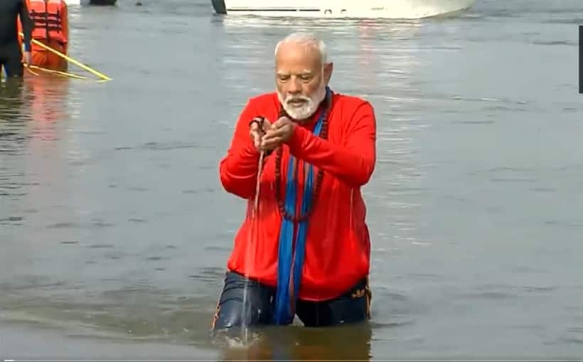 PM Modi takes holy dip at Triveni Sangam in Maha Kumbh, performs Ganga Puja (WATCH)