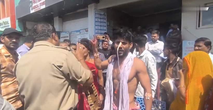 MP man in 'coma' walks out of hospital with tubes attached, accuses doctors of minting money (WATCH)