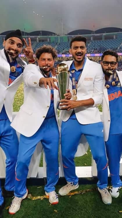 Players' photo with the trophy after winning the Champions Trophy