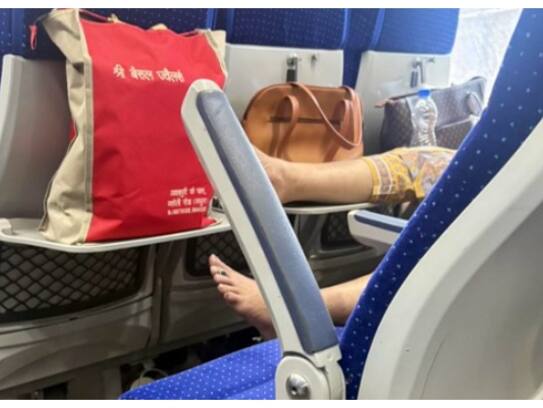 Social media criticises woman for putting her foot on food tray on train