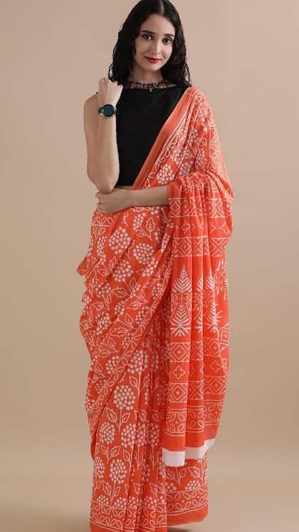 3. Orange-White Print Saree
