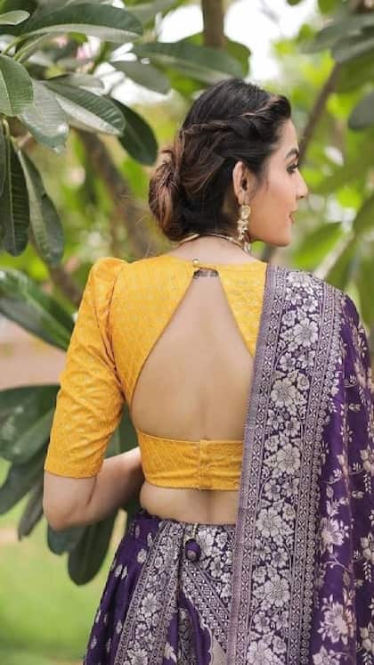 <p>బనారస్ చీరైనా, సిల్క్ చీరైనా, మీ లుక్‌కి పర్ఫెక్ట్ టచ్ ఇవ్వాలంటే ఇలాంటి హై నెక్ బ్లౌజ్ డిజైన్ ట్రై చేయండి. చాలా స్టైలిష్‌గా కనిపిస్తారు.</p>
