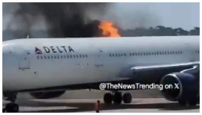 video of a delta plane with 294 people on board caught fire on its wings