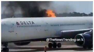 video of a delta plane with 294 people on board caught fire on its wings video of a delta plane with 294 people on board caught fire on its wings