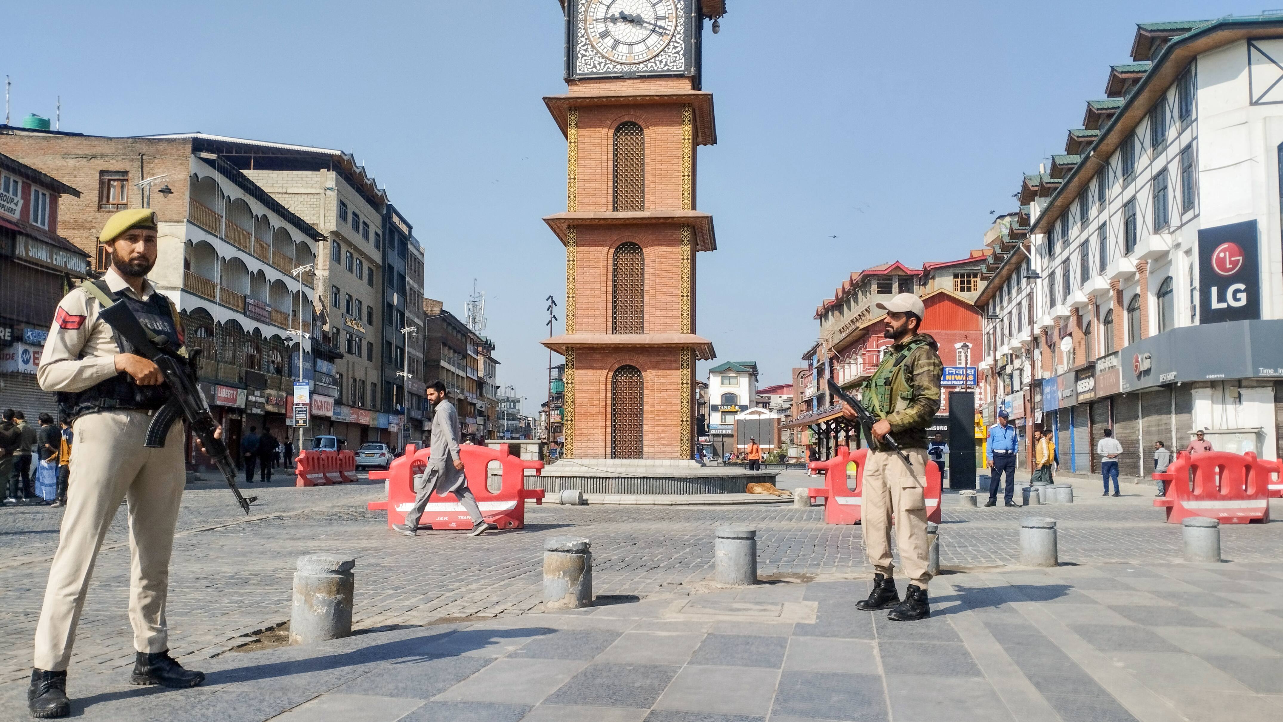 J&K police personnel stand guard at Lal Chowk following Pahalgam terror attack