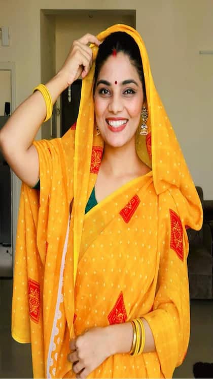 Who is Neha Singh Rathore, booked for sedition