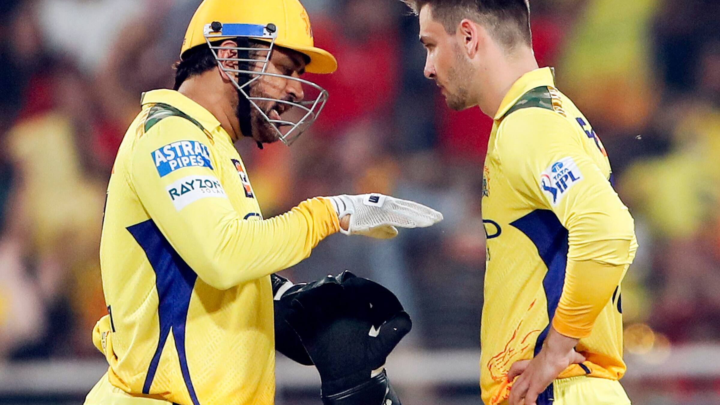 Chennai Super Kings' former captain MS Dhoni in conversation with bowler Noor Ahmad