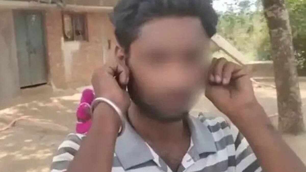 A young man doing sit-ups while holding his ears in Satna