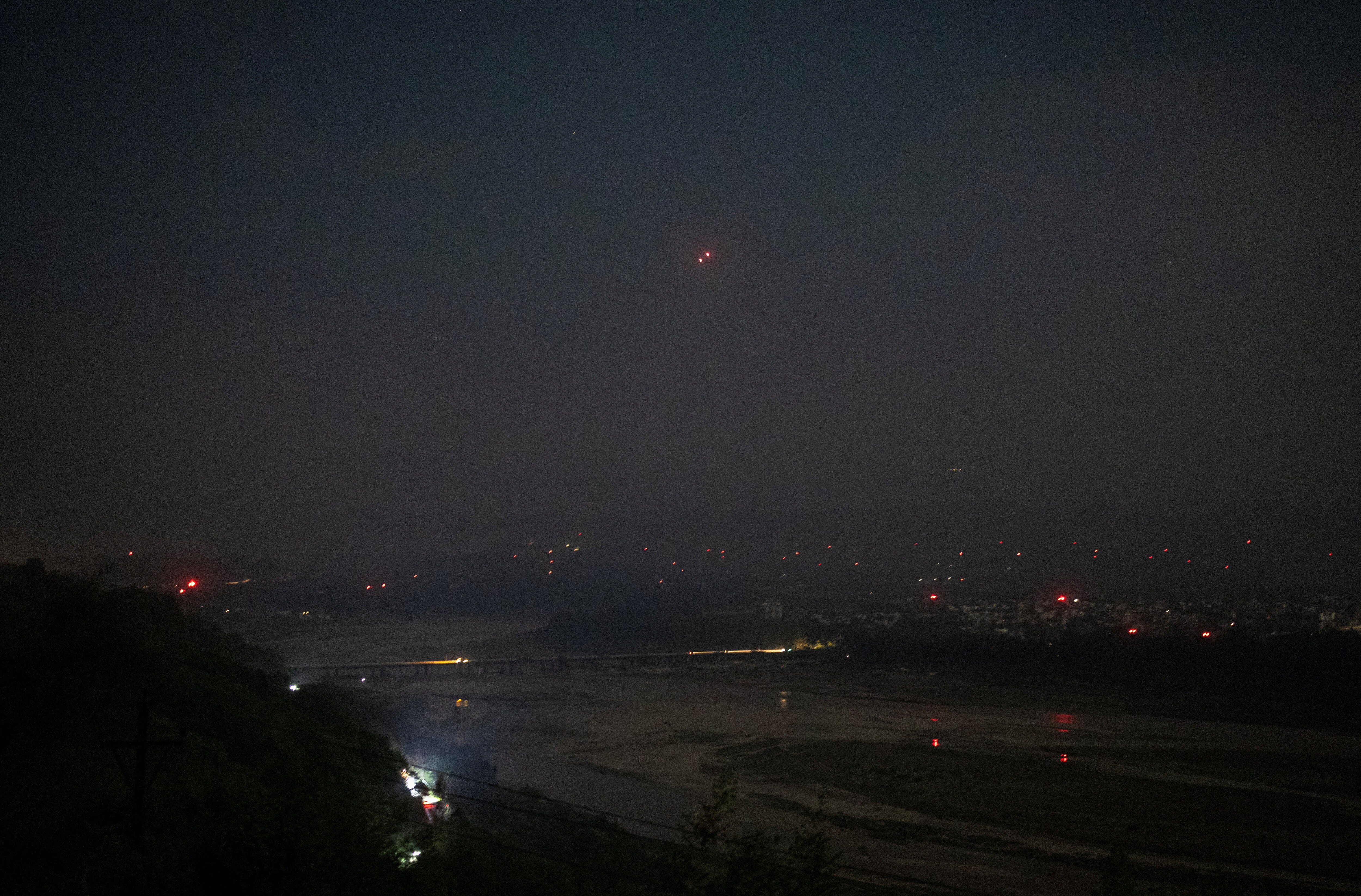 India's air defence system intercepts objects in the sky during a blackout following multiple blasts in the city of Jammu India's air defence system intercepts objects in the sky during a blackout following multiple blasts in the city of Jammu