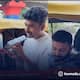 student using ChatGPT  for bargaining with auto driver suc 