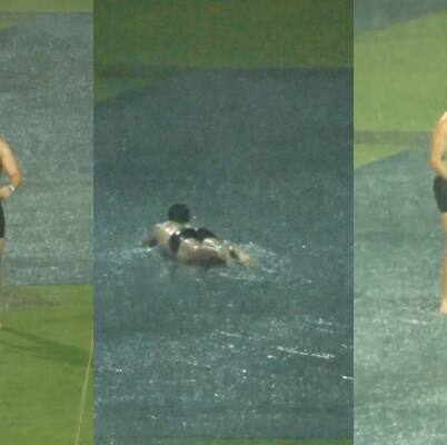 IPL 2025: RCB batter Tim David enjoys rain in Bengaluru, dives over ground covers (WATCH)