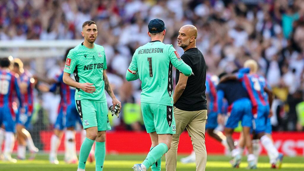 Pep Guardiola and Dean Henderson