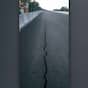 Crack in National Highway 66 in Chavakkad, Thrissur; National Highway authorities covered it with tar at night after the visuals spread