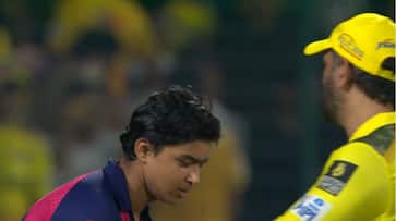 Vaibhav Suryavanshi touching MS Dhoni's feet after RR beat CSK Vaibhav Suryavanshi touching MS Dhoni's feet after RR beat CSK
