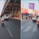 Woman beats husband with slippers while riding bike: Video viral