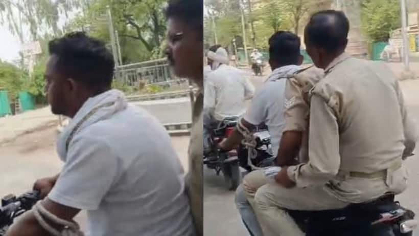 lalitpur police viral video handcuffed prisoner driving bike investigation