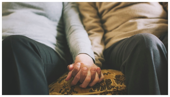 lovers holding their hands