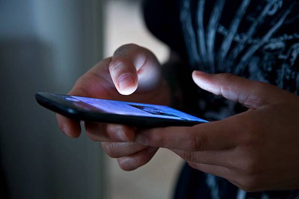 Watching mobile phone reels addict