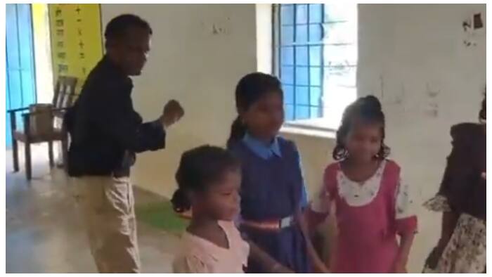 drunk teacher dancing with students at Chhattisgarh