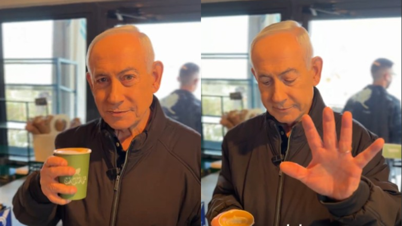 Israeli PM Benjamin Netanyahu showing his fingers to the camera in a cafe to debunk AI-generated video rumors