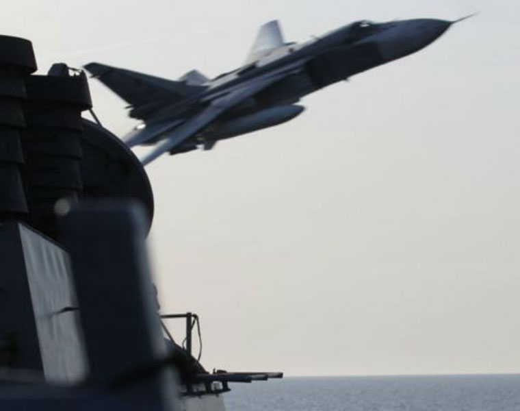 Russian warplanes pass US missile destroyer