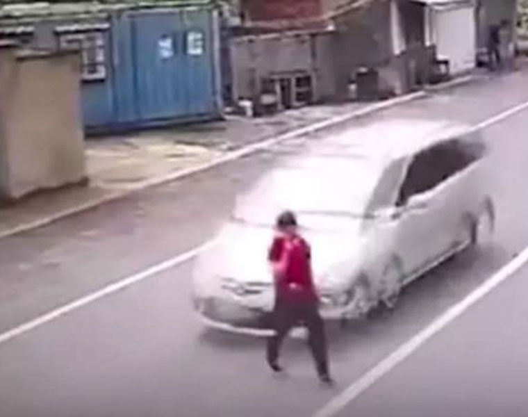 Pedestrian hit by high speed car only loses her shoe