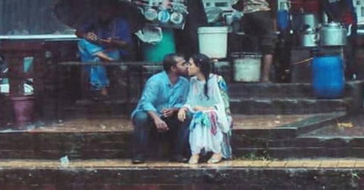 young lovers kissing in rain; Bangladeshi photographer thrashed