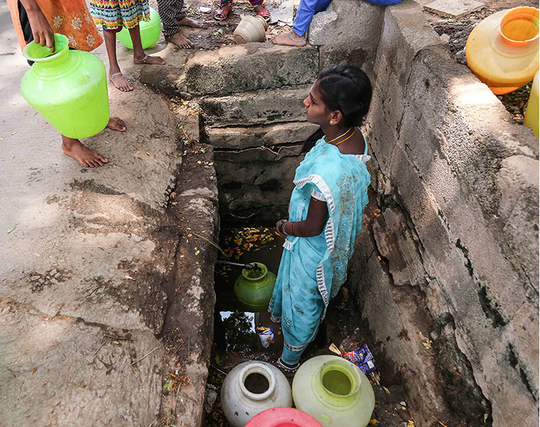 This dirty pit provides drinking water for Shanthinagar residents