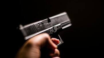 Noida amity university college student arrested pointing gun