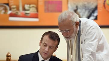 PM Modi Macron Cochin Airport UN annual Champions of the Earth