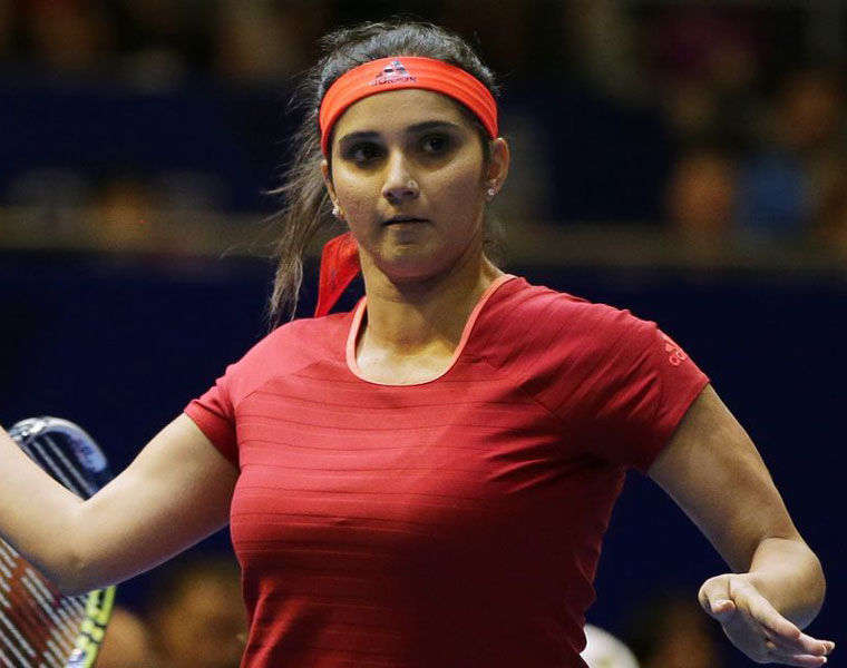 Sania practises prenatal yoga, gets praise from Maneka Gandhi