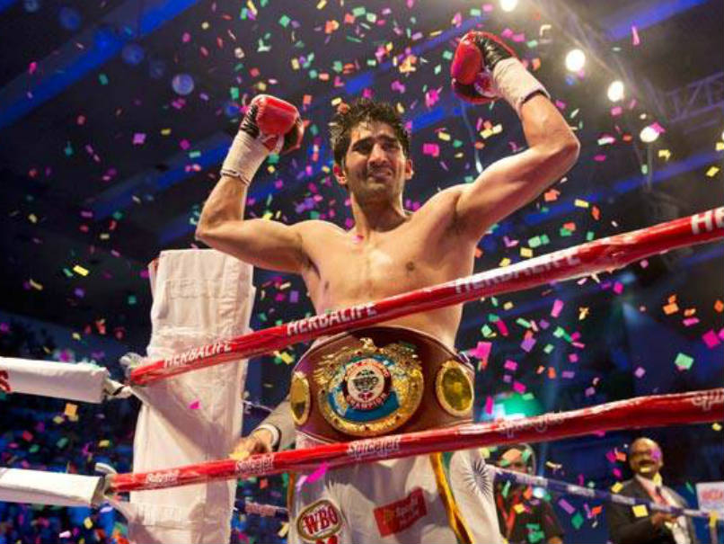 Indian Boxing Star Vijender Singh beats Mike Snider to clinch 11th consecutive victory