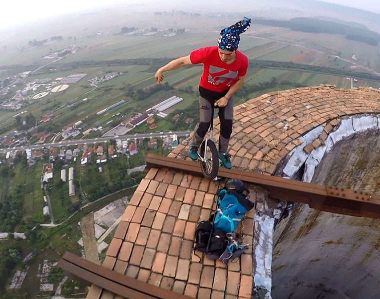 Unicycle on huge chimney in Targu Jiu