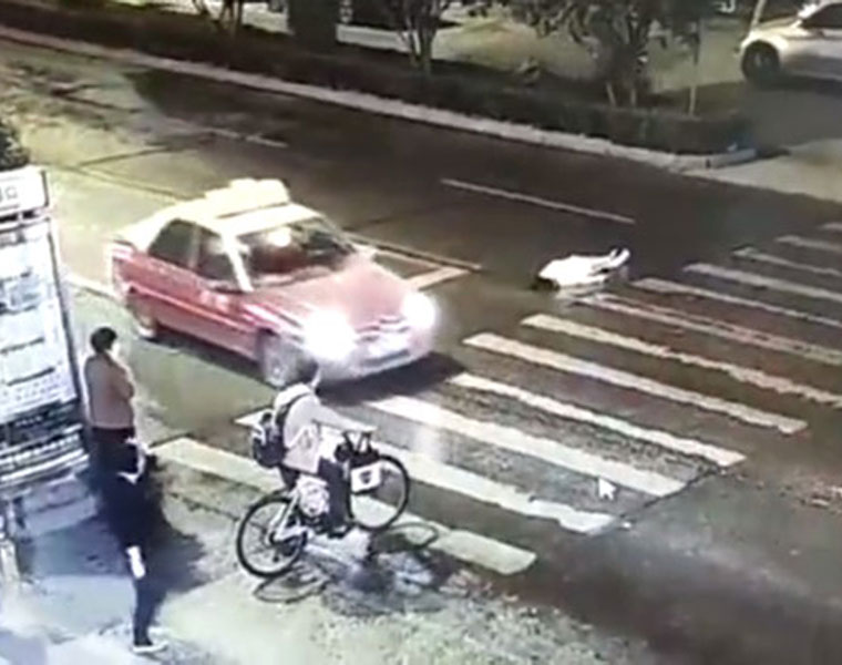 Woman gets hit by car dozens pass by without a care before she gets run over again