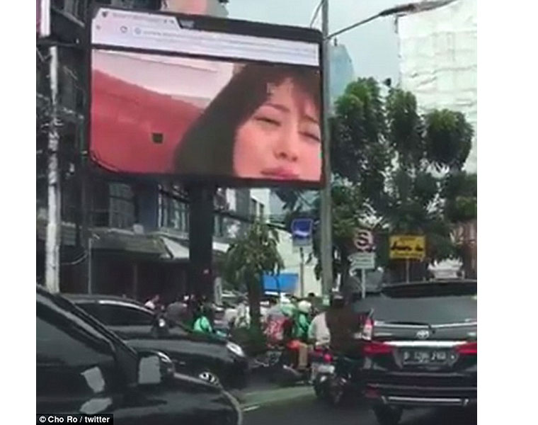 Bored IT worker hacks into giant electronic billboard and streams PORN during his commute