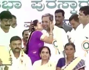 Woman kisses Karnataka Chief Minister in public