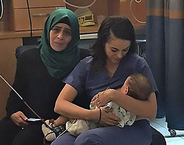 Israeli nurse breastfeeds Palestinian baby after his mom is critically injured