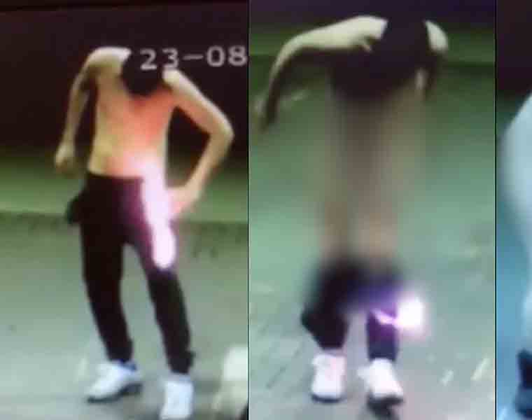 This drunk man dances naked and sets himself on fire