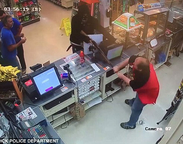 Clerk Wrestles Shotgun Away From Robber