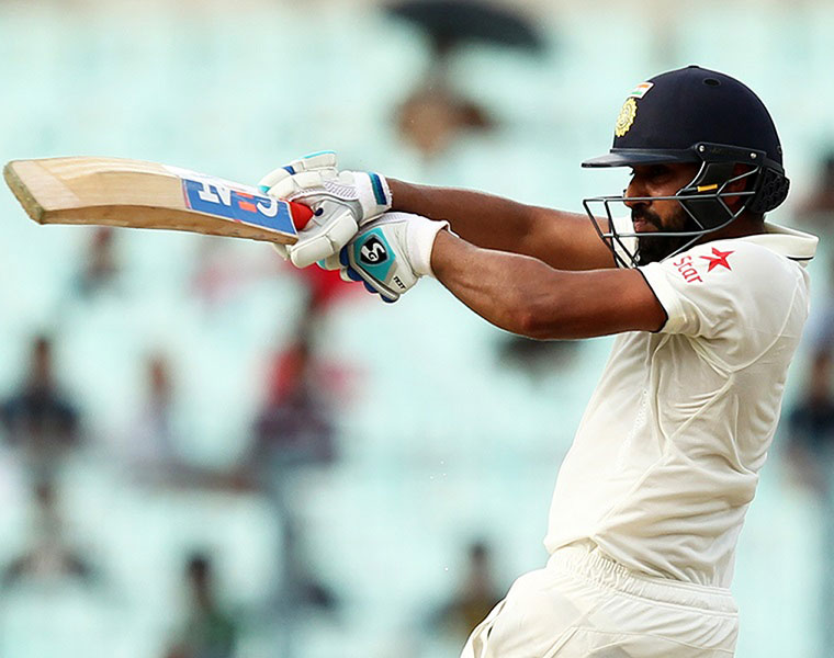 rohith sharma gets fifty