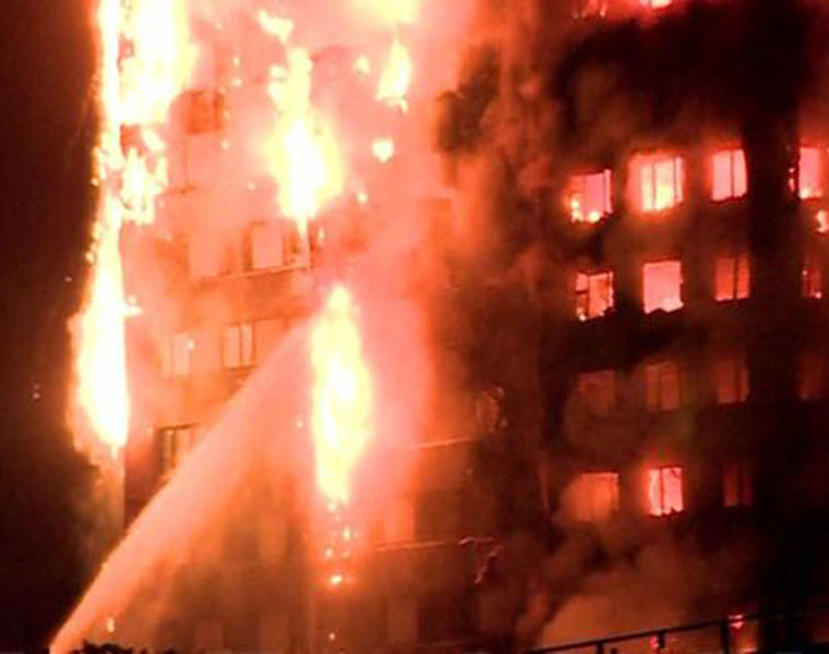 London fire children thrown out saves one